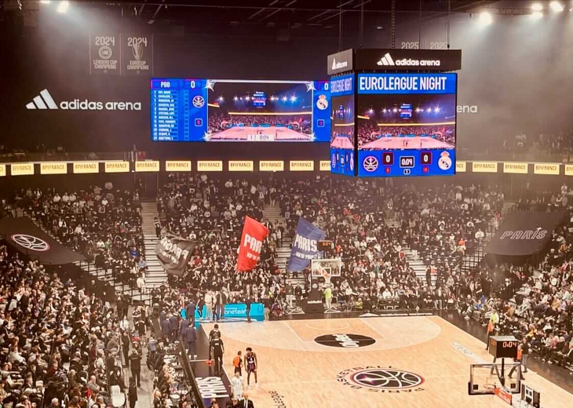 Porte de la Chapelle — Paris 18th Guide 3 Paris Basketball EuroLeague — packed Adidas Arena at night