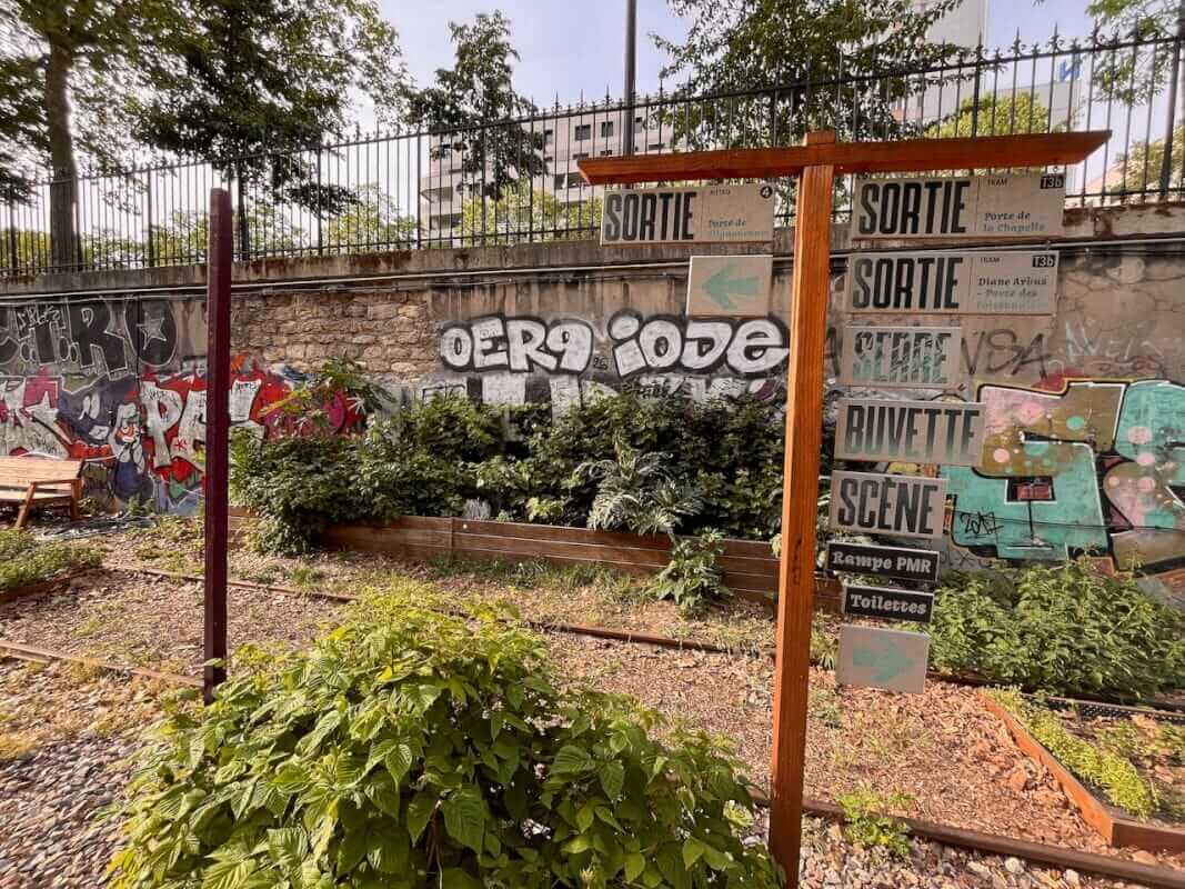 Jardin des Traverses: Paris's Hidden Railway Garden Near Adidas Arena 6 Jardin des Traverses directional sign with tram T3b indication